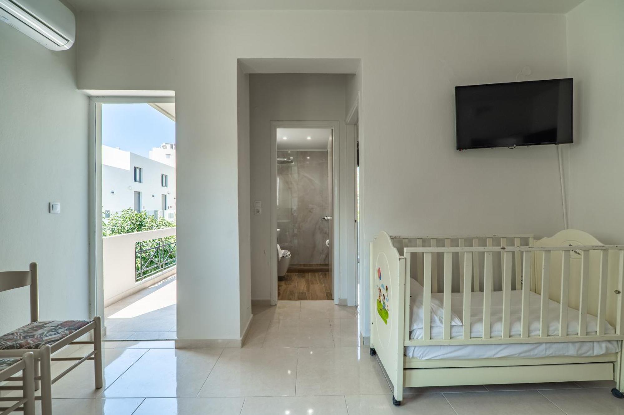 Manos Beachside Apartments Agia Marina Quarto foto