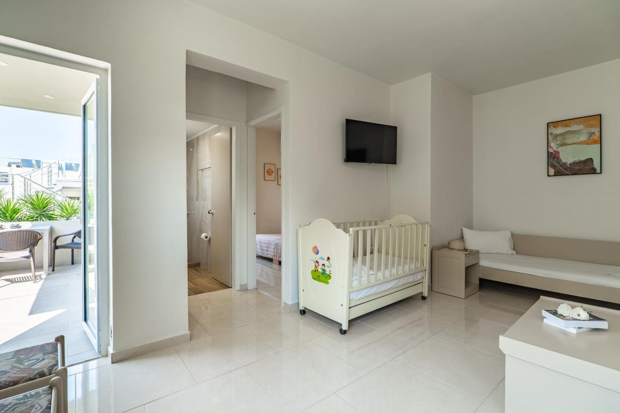 Manos Beachside Apartments Agia Marina Quarto foto